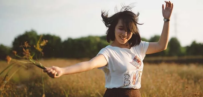 Woman Feeling Free in Field